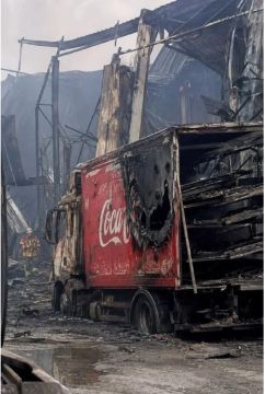 На сгоревшем под Киевом заводе Coca-Cola заметили уничтоженные грузовики с направляющими для запуска дронов