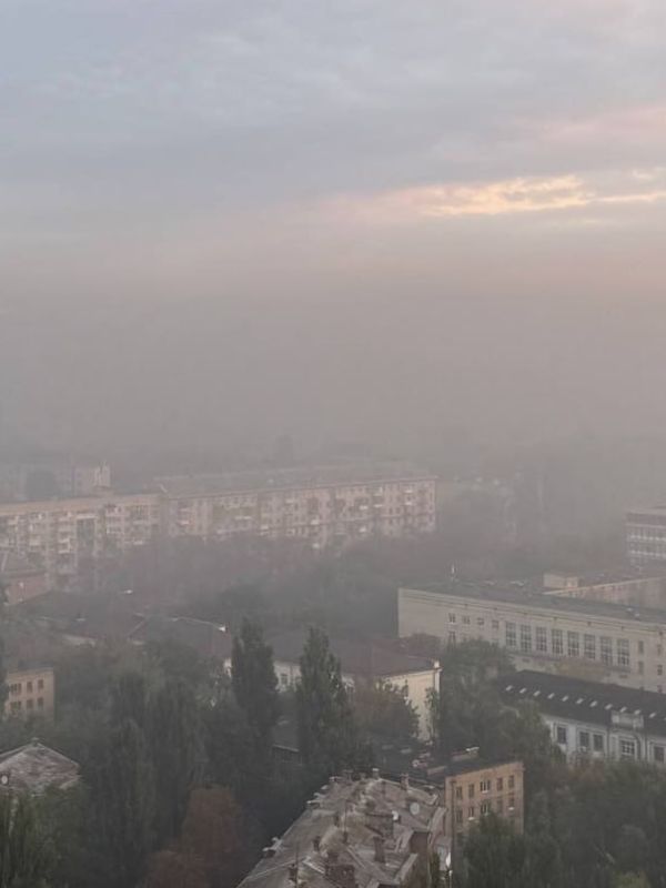 Затянутый дымом после ударов Киев Затянутый дымом после ударов Киев
